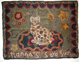 Cat on Braided Rug